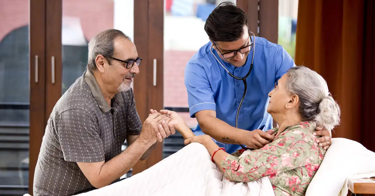 Nurse assisting family with homecare